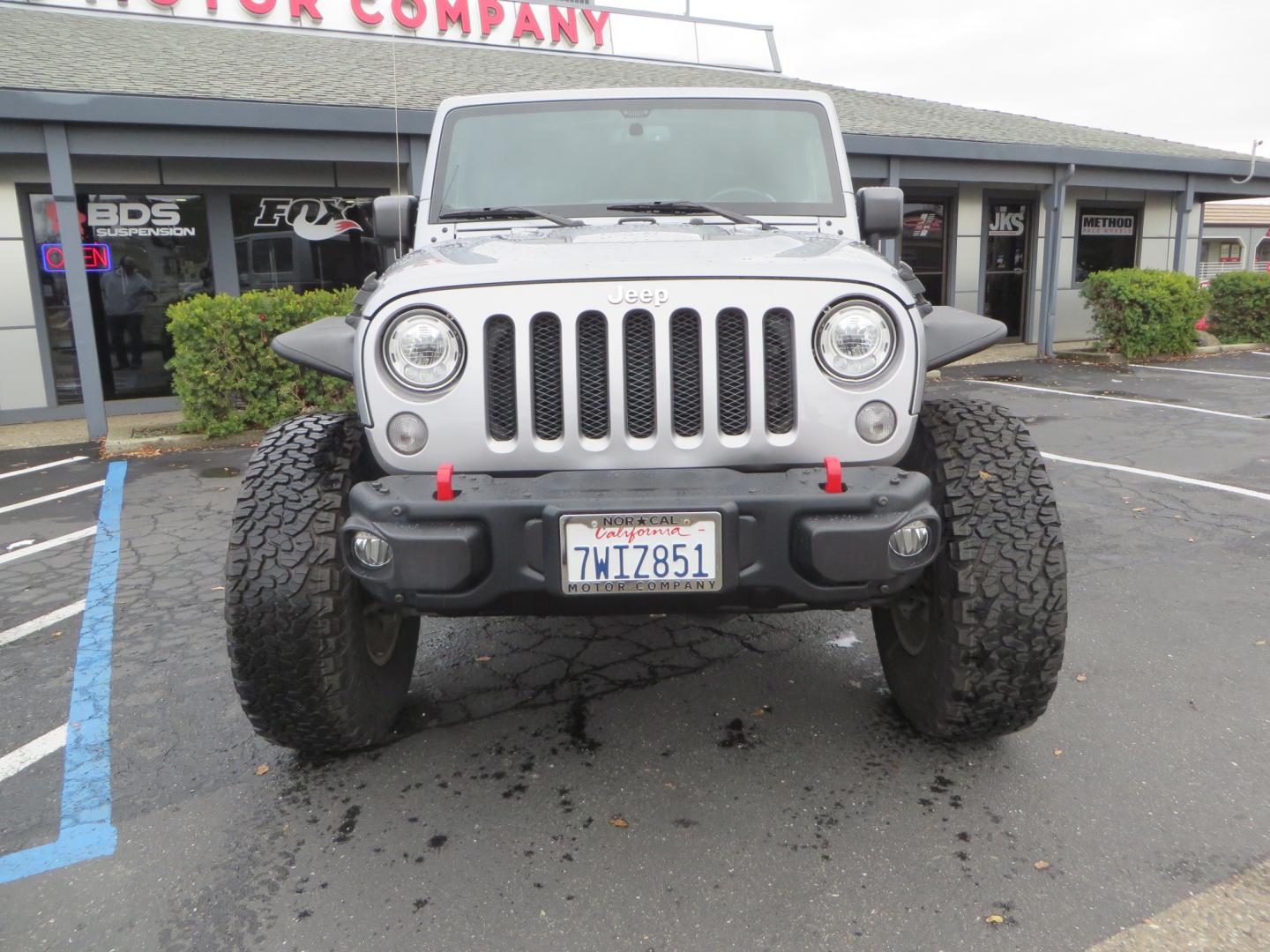 2017 SILVER /BLACK Jeep Wrangler Unlimited Rubicon 4WD (1C4BJWFG3HL) with an 3.6L V6 DOHC 24V FFV engine, automatic transmission, located at 2630 Grass Valley Highway, Auburn, CA, 95603, (530) 508-5100, 38.937893, -121.095482 - Rubicon sitting on a Teraflex suspension system, Falcon shocks, 37" BFG KO2 tires, 17" Hardrock wheels, RC Fender Flares, and AMP steps. - Photo#1